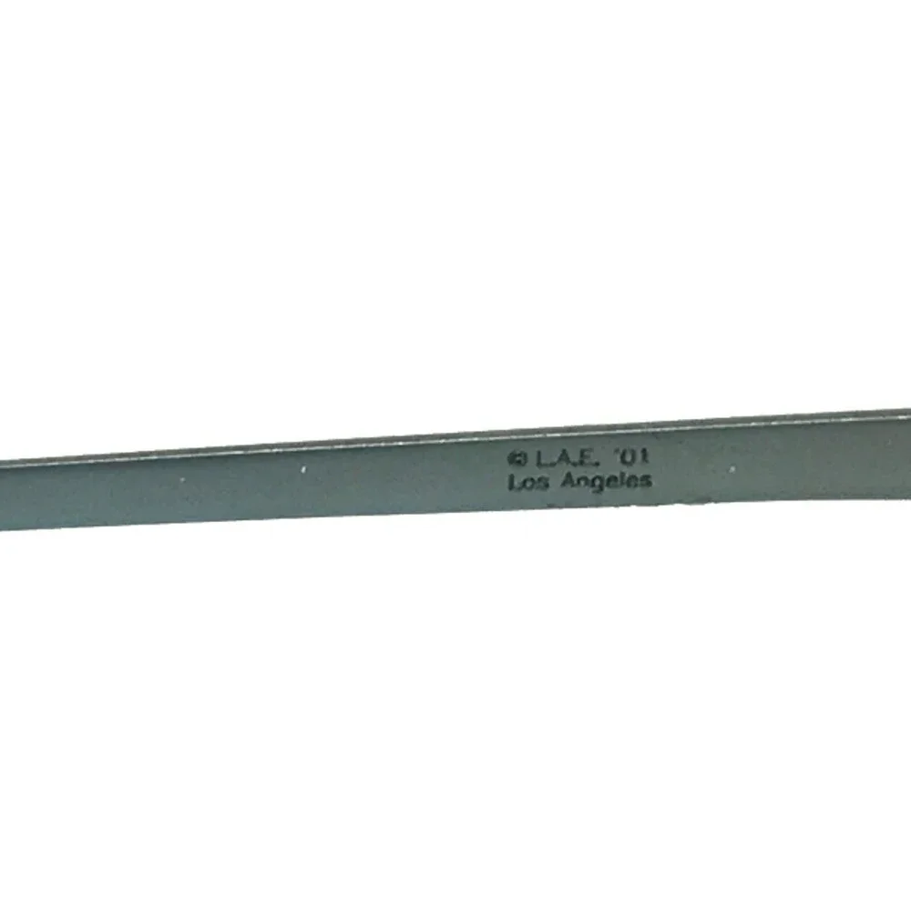 Vintage la Eyeworks Eyeglasses Frames PUNCH 576 Shiny Ice Light Blue 47-20-125